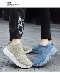 Close-up of breathable flyknit fabric texture and slip-on design of men's walking shoes
