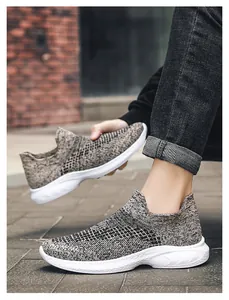 Close-up of lightweight slip-on knit walking shoes with a flexible white cushioned sole