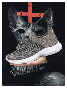 Close-up of lightweight knit slip-on sneaker with textured thick white anti-slip sole