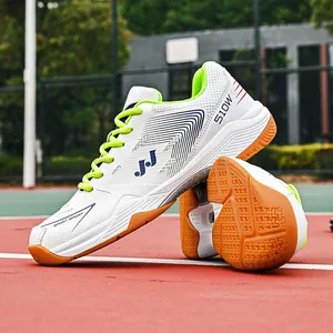 Lichte witte badmintonschoenen met neongroene veters en antislip rubberen buitenzool