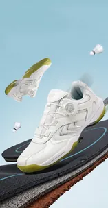 Detail of professional badminton shoes featuring breathable mesh and rotating dial lace system
