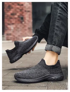 Detail of breathable dark grey knit fabric and slip-on collar of these casual walking shoes