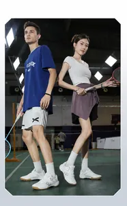 Action shot of men's and women's lightweight professional badminton court shoes in white