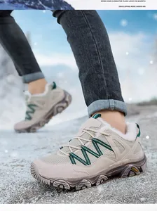 Detail of warm winter hiking shoes with thick white lining and rugged outdoor sole