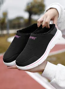Close-up of winter thermal slippers with thick faux fur lining and flexible soft sole
