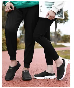 Close-up of winter slip-on thermal mules with thick warm plush lining and non-slip sole