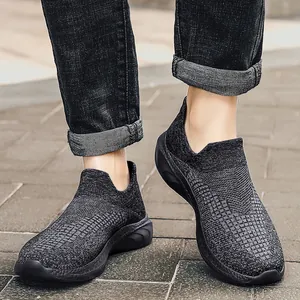 Men's breathable knit slip-on sneakers with grey textured fabric and shock-absorbing soles