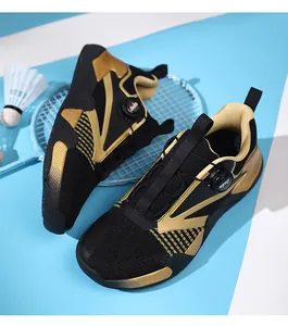 Detail of professional black and gold sports shoes with breathable mesh and knob lacing system