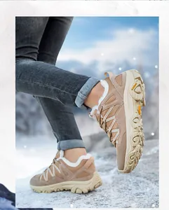 Detail of warm winter hiking boots with fleece lining and durable outdoor grip soles