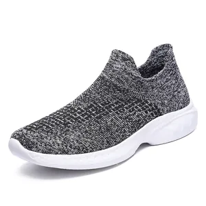 Breathable knit mesh slip-on sneakers in grey and white with lightweight thick soles