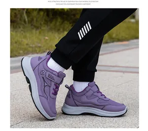 Close-up of lightweight purple walking shoes with breathable mesh and EVA anti-slip sole