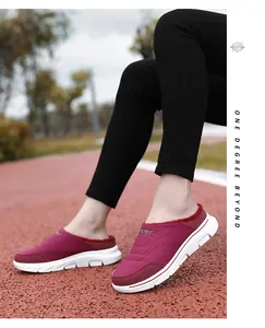 Detail of winter thermal slippers with plush lining and non-slip thick white sole