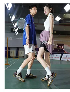 Close-up of indoor badminton shoes featuring carbon plates and non-slip rubber soles