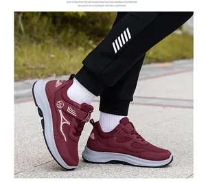 Detail of burgundy walking shoe featuring lightweight EVA sole and breathable mesh upper