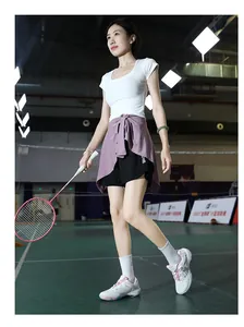 Action shot of professional badminton shoes with a carbon plate and rotating buckle system