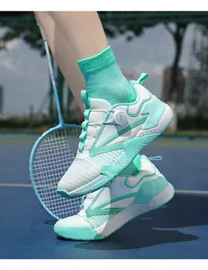 Detail of the quick-dial lacing system on professional mint green badminton shoes