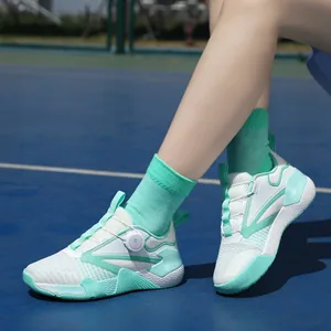 Women's mint green breathable sports shoes with rotary dial closure on athletic track
