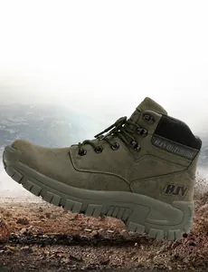 Detailed macro view of military green hiking shoes with high-top ankle support and lug sole