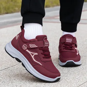 Comfortable burgundy mesh walking shoes for seniors with non-slip sole and velcro strap