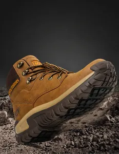Macro shot of non-slip rubber outsole with deep traction patterns on hiking boots