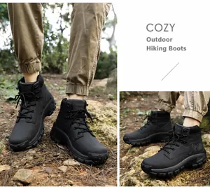 Detail of durable black outdoor hiking boots with rugged anti-slip rubber soles for men
