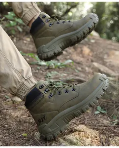 Detail of durable HJV tactical hiking boot featuring rugged non-slip rubber soles and deep lugs