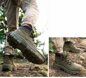 Detail view of olive green outdoor hiking boots with rugged anti-slip rubber outsoles