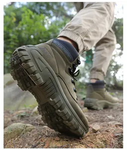 Detailed view of heavy-duty rubber outsole with deep anti-slip treads for hiking