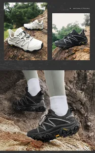 Close-up of durable outdoor hiking shoes with non-slip thick rubber soles on rocky terrain