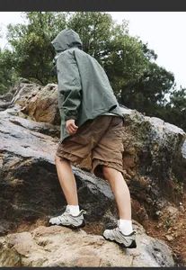 Outdoor hiking shoes with waterproof fabric and rugged thick soles for mountain trekking