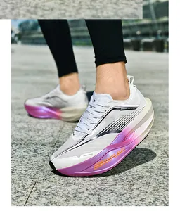 Detail view of white breathable woven running shoes with pink purple gradient cushioning soles