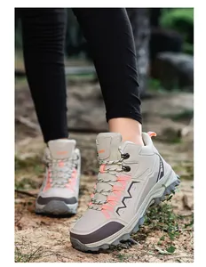 Outdoor hiking boots featuring non-slip rubber soles and durable mesh material on trails