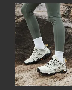 Close-up of durable hiking shoes featuring a quick-lace system and rugged rubber sole