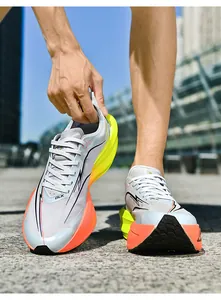 Close-up of breathable knit running shoes with thick gradient cushioning sole