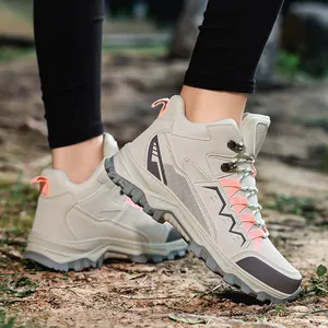 Women's outdoor hiking boots in beige and grey with durable non-slip thick rubber soles