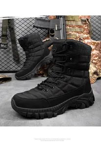 Detail of high-top tactical boots featuring suede panels and deep-lug anti-slip rubber soles
