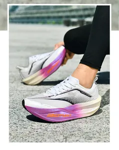 Detail of breathable mesh upper and gradient foam midsole on professional running shoes