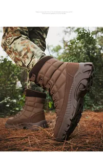 Detail of high-top tactical boots featuring brown suede and rugged anti-slip rubber outsoles