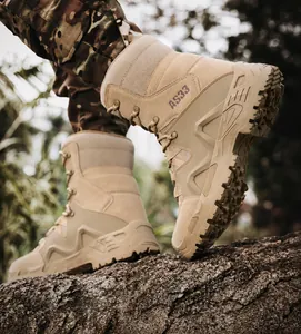 Close-up of durable tactical boots featuring AS33 logo and anti-slip rubber soles