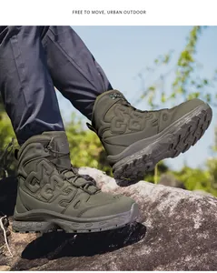 Side detail of olive green tactical boots featuring 3322 embossed design on rock terrain