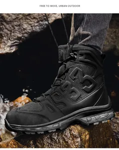 Detail of black tactical high-top boots with mesh panels and 533 design by the river