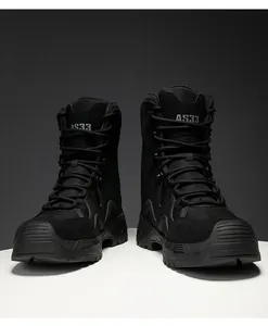 Close-up of black tactical boots with durable nubuck leather and breathable mesh fabric
