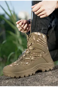 Detail of high-top tactical boots with A539 imprint and camouflage pattern design