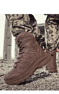 Close-up of brown tactical boots showing nubuck leather texture and anti-slip rubber sole
