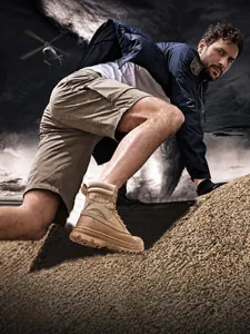 Close-up of wolf brown tactical boots featuring anti-slip soles for outdoor hiking