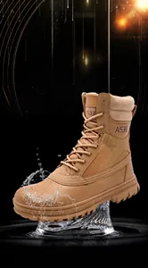 Close-up of khaki waterproof tactical hiking boots for men with splash water effect