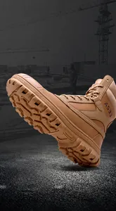 Detail view of khaki tactical boot showing slip-resistant rubber sole with traction patterns