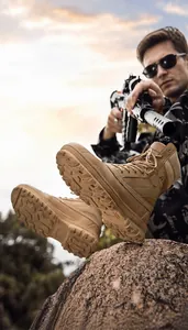 Detail view of khaki tactical combat boots with side zipper and deep-tread anti-slip sole
