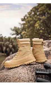 Detail of khaki tactical hiking boot with AS33 logo and rugged high-top design