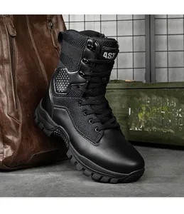 Macro shot of breathable side vents and leather texture on black tactical combat boots